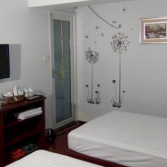 Отель Meiju Fashion Apartment Hotel Китай, Сиань - отзывы, цены и фото номеров - забронировать отель Meiju Fashion Apartment Hotel онлайн комната для гостей фото 2