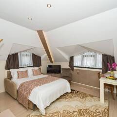 Отель Gen Suites комната для гостей
