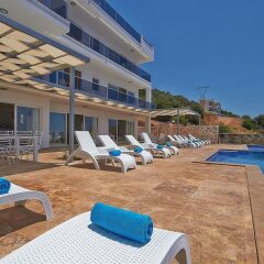 Villa Falcon Exclusive by Akdenizvillam Турция, Калкан - отзывы, цены и фото номеров - забронировать отель Villa Falcon Exclusive by Akdenizvillam онлайн пляж