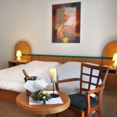 Hotel Maxim комната для гостей
