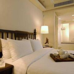 Отель Saladaeng Colonnade Serviced Apartment Таиланд, Бангкок - отзывы, цены и фото номеров - забронировать отель Saladaeng Colonnade Serviced Apartment онлайн комната для гостей фото 2
