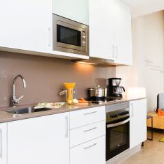 Апартаменты Feelathome Plaza Apartments в номере фото 3
