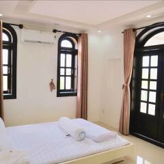 Отель Anvien Villa Nhatrang Вьетнам, Нячанг - отзывы, цены и фото номеров - забронировать отель Anvien Villa Nhatrang онлайн комната для гостей фото 2