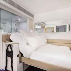 Отель Yotelair Singapore Changi Airport Сингапур комната для гостей фото 5