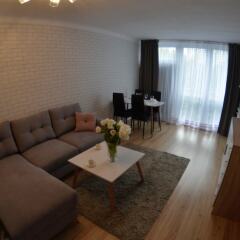 Апартаменты Panda Apartments Grzybowska-Centrum комната для гостей