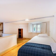 Отель Central Downtown Deluxe Duplex Португалия, Лиссабон - отзывы, цены и фото номеров - забронировать отель Central Downtown Deluxe Duplex онлайн комната для гостей фото 2