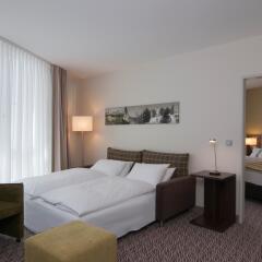 Отель Holiday Inn Munich-Unterhaching Германия, Унтерхахинг - 7 отзывов об отеле, цены и фото номеров - забронировать отель Holiday Inn Munich-Unterhaching онлайн комната для гостей