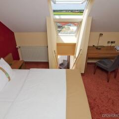 Отель Holiday Inn Munich-Unterhaching Германия, Унтерхахинг - 7 отзывов об отеле, цены и фото номеров - забронировать отель Holiday Inn Munich-Unterhaching онлайн комната для гостей фото 4