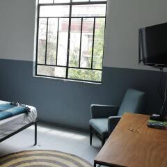 Отель Stayinn Barefoot Condesa Мехико комната для гостей