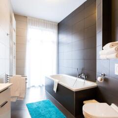 Отель Grand Central Apartments Бельгия, Брюссель - отзывы, цены и фото номеров - забронировать отель Grand Central Apartments онлайн ванная фото 2
