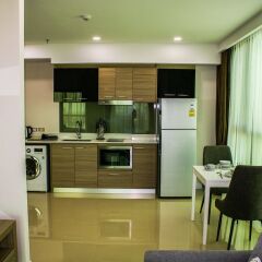 Отель Dusit Grand Condo View Jomtien Паттайя в номере фото 2