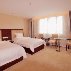 Отель Jinxing Holiday Hotel - Zhongshan Китай, Чжуншань - отзывы, цены и фото номеров - забронировать отель Jinxing Holiday Hotel - Zhongshan онлайн комната для гостей фото 5