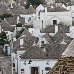 Отель Trulli Resort Monte Pasubio Альберобелло