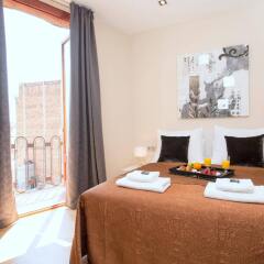 Апартаменты Plaza España Apartments Барселона комната для гостей фото 5