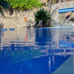 Отель Binniguenda Huatulco - Все включено с домашними животными