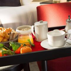 Отель Les Matins De Paris Париж в номере фото 2