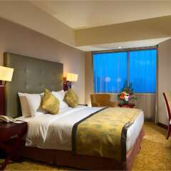 Отель Days Hotel & Suites Xinxing Xian Китай, Сиань - отзывы, цены и фото номеров - забронировать отель Days Hotel & Suites Xinxing Xian онлайн комната для гостей фото 3