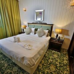Апартаменты Midtown Furnished Apartments ОАЭ, Аджман - отзывы, цены и фото номеров - забронировать отель Midtown Furnished Apartments онлайн комната для гостей фото 2