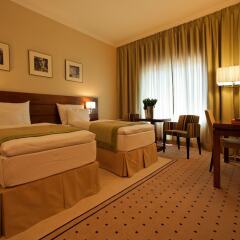 Capital Plaza Hotel комната для гостей фото 5