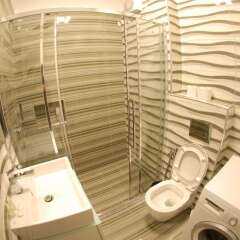 Апартаменты White Deluxe Apartments ванная