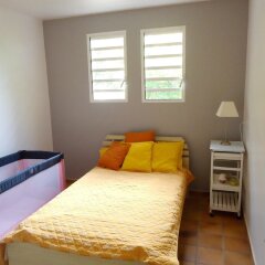 Apartment With 2 Bedrooms in Gourbeyre, With Wonderful sea View, Furnished Terrace and Wifi - 6 km From the Beach in Pointe-Noire, France from 177$, photos, reviews - zenhotels.com guestroom