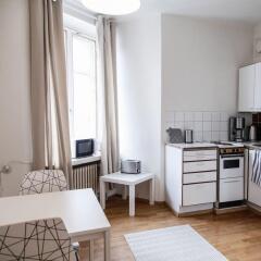 Апартаменты Experience Living Urban Apartments в номере
