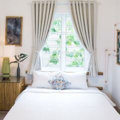 Отель Hoi An Unique House Хойан комната для гостей фото 3