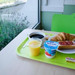 Отель ibis Budget Aeroport le Bourget Garonor в номере