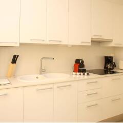 Апартаменты MH Apartments Suites в номере