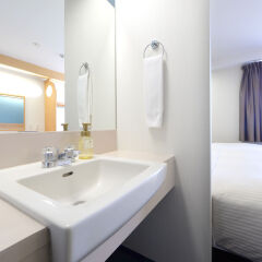 Отель Vessel Hotel Kumamoto Airport Япония, Асо - отзывы, цены и фото номеров - забронировать отель Vessel Hotel Kumamoto Airport онлайн ванная