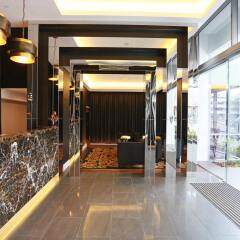 Alex Perry Hotel & Apartments интерьер отеля фото 2