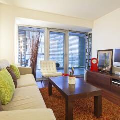 Апартаменты You Stylish Beach Apartments комната для гостей фото 2