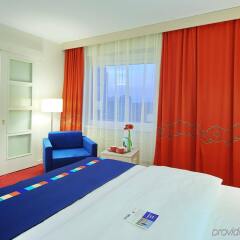 Гостиница Park Inn by Radisson Пулковская комната для гостей фото 5