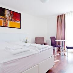 Апартаменты Suite Apartments By Livingdowntown Цюрих комната для гостей фото 2