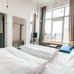 Отель FELIX Suiten im Lebendigen Haus am Augustusplatz комната для гостей