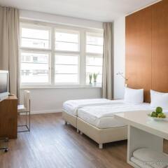 Отель Ellington Hotel Berlin Германия, Берлин - 1 отзыв об отеле, цены и фото номеров - забронировать отель Ellington Hotel Berlin онлайн комната для гостей фото 2