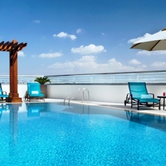 Отель Hilton Garden Inn Dubai Al Muraqabat бассейн фото 2
