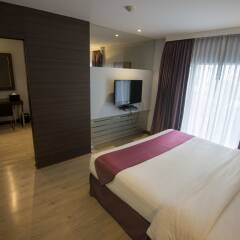 Отель Sukhumvit Suites Бангкок комната для гостей фото 4