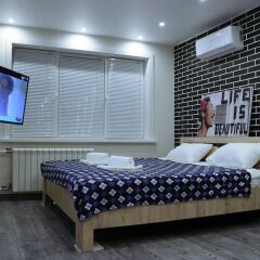 Гостиница B2BAPARTMENTS - Apartments Soft Loft on Vatutina в Новосибирске отзывы, цены и фото номеров - забронировать гостиницу B2BAPARTMENTS - Apartments Soft Loft on Vatutina онлайн Новосибирск комната для гостей фото 3