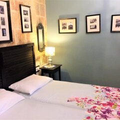 Отель Luciano Valletta Boutique Мальта, Валетта - отзывы, цены и фото номеров - забронировать отель Luciano Valletta Boutique онлайн комната для гостей