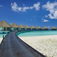 Отель Adaaran Prestige Water Villas Медупару пляж
