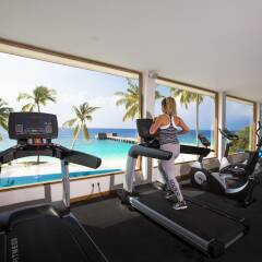 Отель Reethi Faru Resort фитнесс-зал фото 4