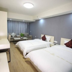 Отель Yi Xin Aparthotel Китай, Шэньчжэнь - отзывы, цены и фото номеров - забронировать отель Yi Xin Aparthotel онлайн комната для гостей фото 2