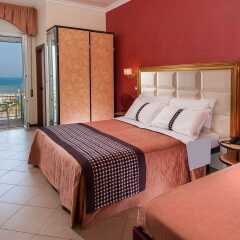 Hotel Helios Римини комната для гостей
