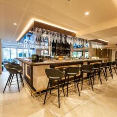 Отель Familien-Wellness Residence Tyrol Натурно гостиничный бар