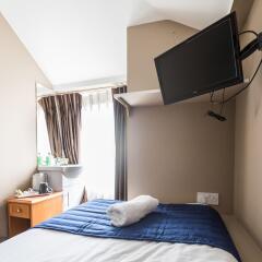 Oyo Belgravia Hotel сейф в номере