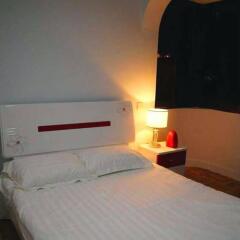 Отель Gulangyu Lianhe Apartment Hotel - Xiamen Китай, Сямынь - отзывы, цены и фото номеров - забронировать отель Gulangyu Lianhe Apartment Hotel - Xiamen онлайн комната для гостей фото 3