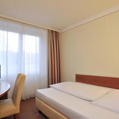 Hotel Concorde München 4* Стандартный номер фото 6