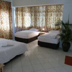 Отель Orange Pekoe Guesthouse Малайзия, Куала-Лумпур - отзывы, цены и фото номеров - забронировать отель Orange Pekoe Guesthouse онлайн комната для гостей фото 3