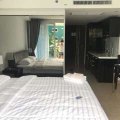 Отель Modernized Condo Seaview Central Pattaya комната для гостей